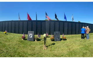 The American Veterans Traveling Tribute includes many touching tributes including a replica of the Vietnam Veterans Memorial in Washington, D.C. featuring the names of over 3,000 casualties. The tribute also showcases the Battlefield Cross (left) representing the honor, service, and sacrifice of soldiers who were killed in battle.